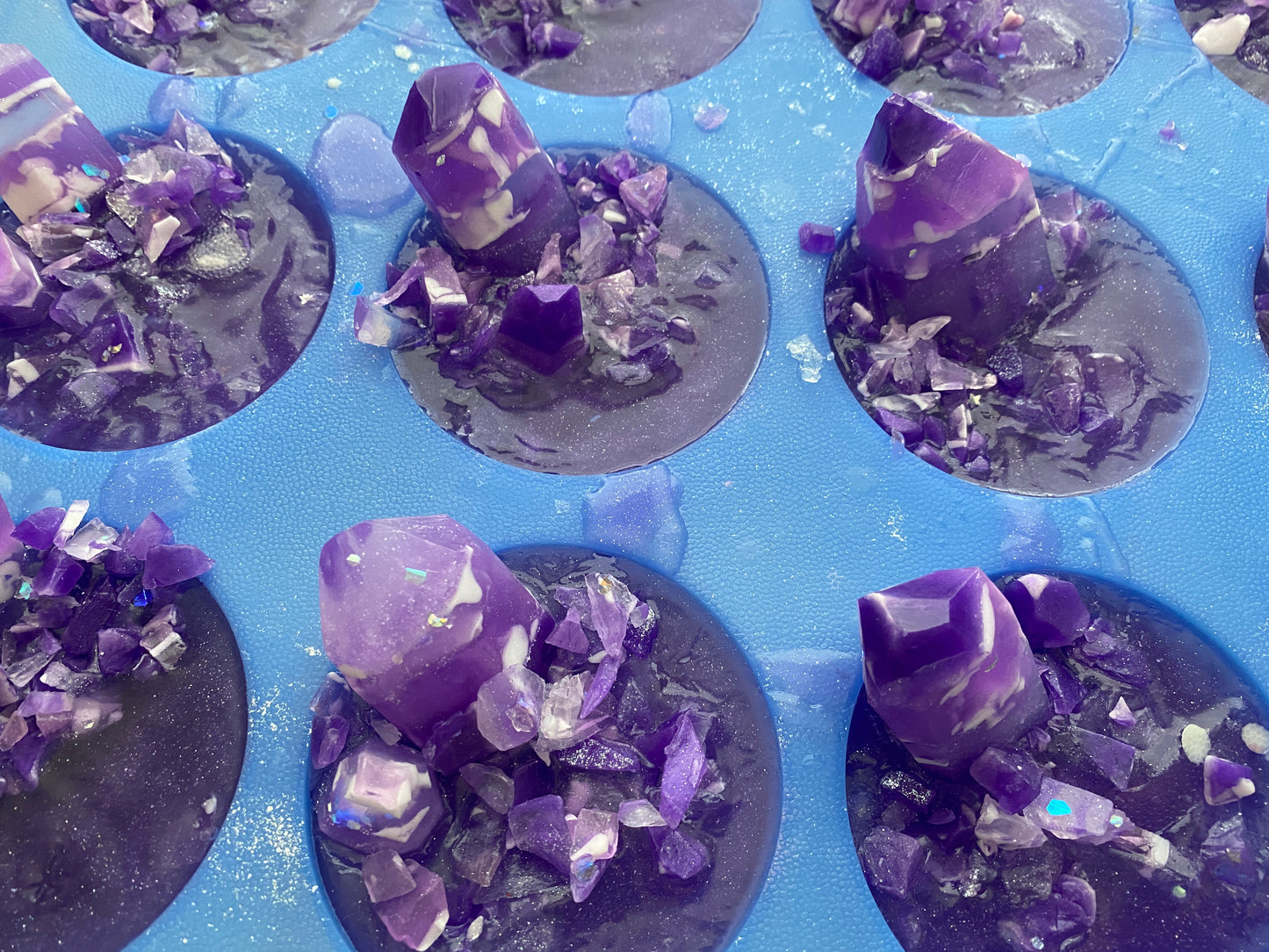 soap bars made to look like amethyst crystals in the mold
